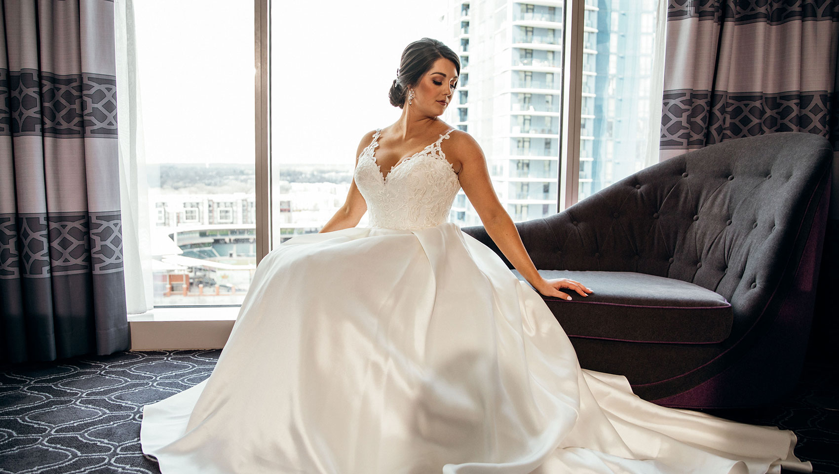 Bride poses in dress
