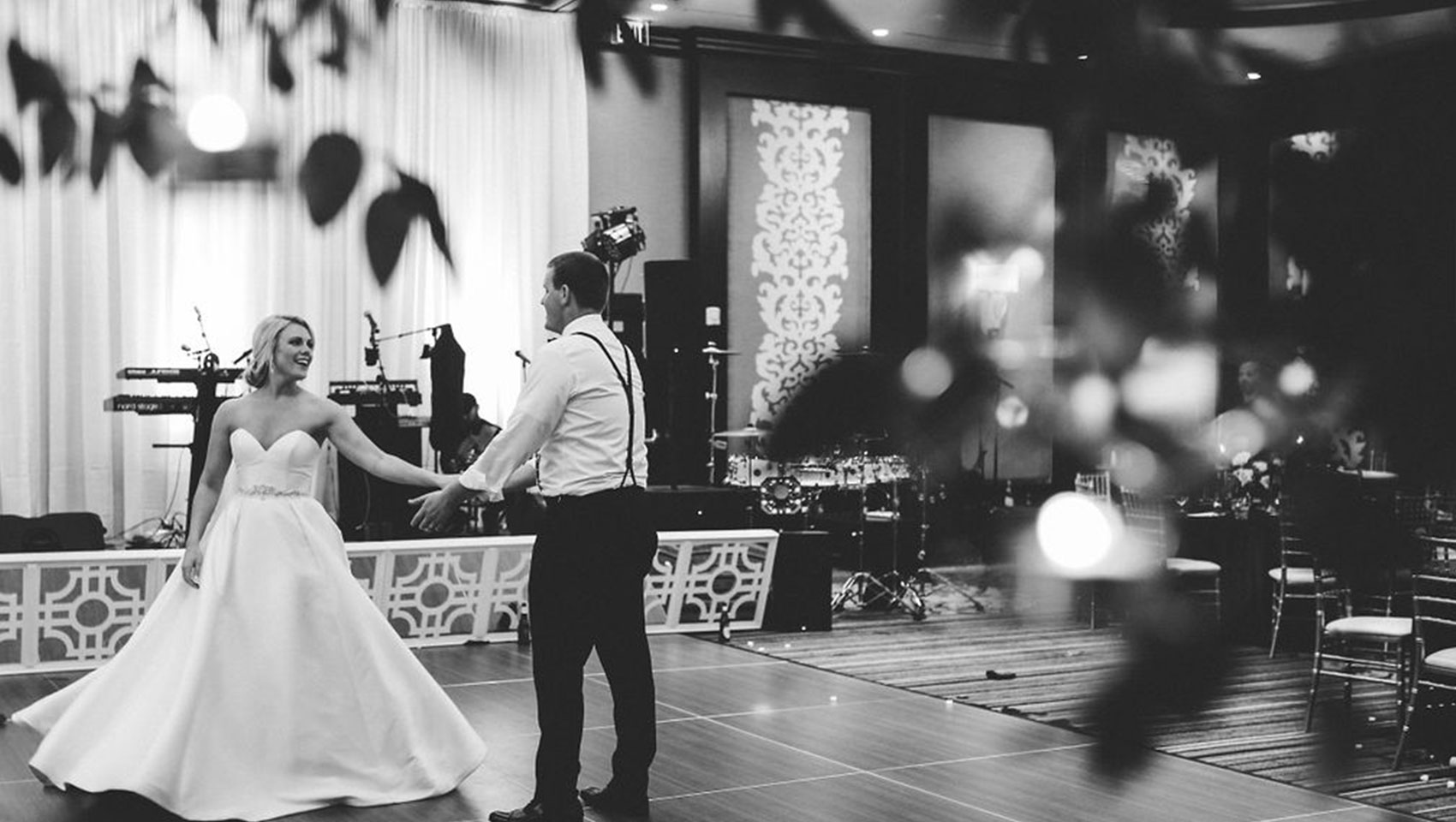black and white shot of newlyweds on the dance floor at Kimpton Tryon Park Hotel