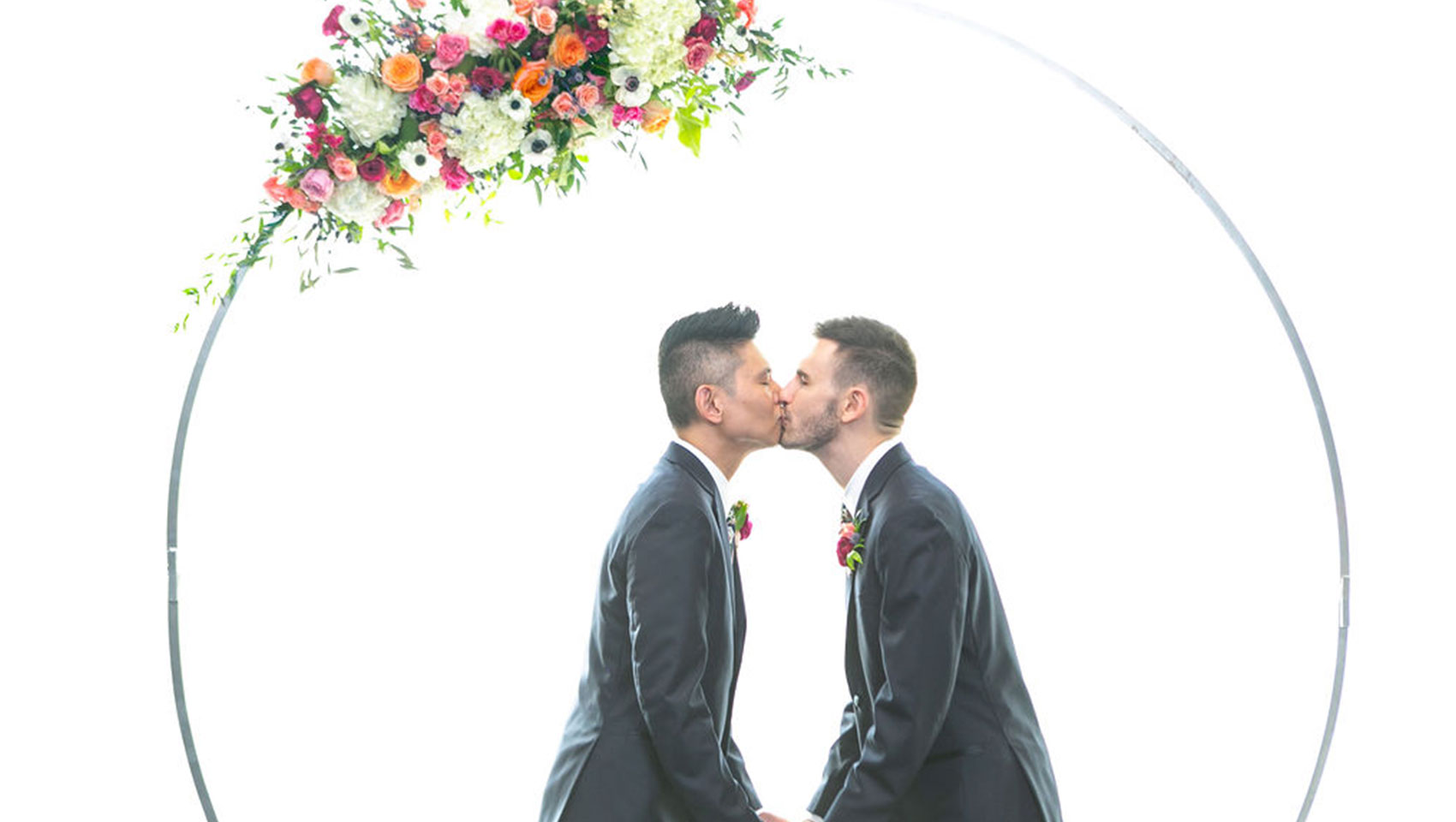 couple under circular hoopa for wedding at Kimpton tryon park