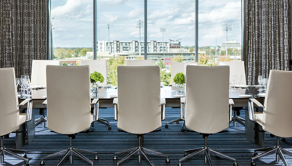 Illiad Meeting Room Chairs at a meeting table