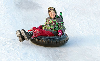 child on sled