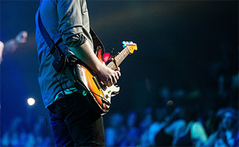 Guitarist in front of crowd