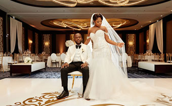 Newlyweds pose at reception